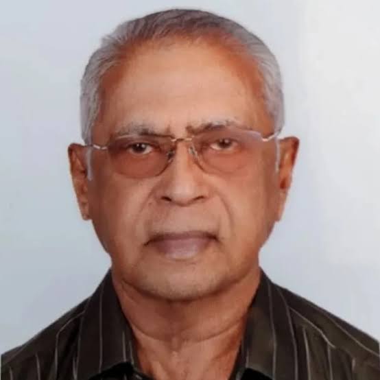 Dr M K Mani